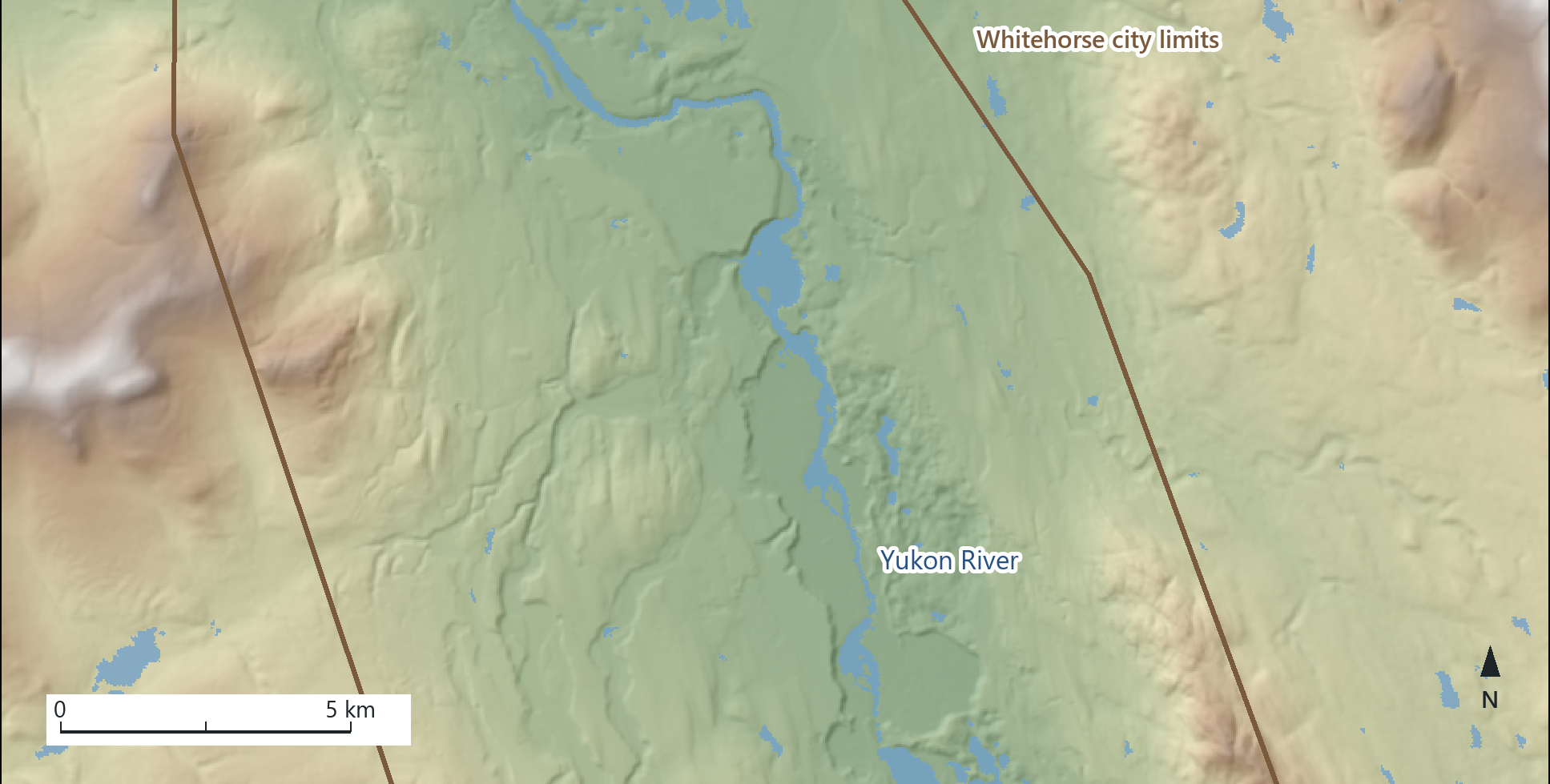 Relief map of Whitehorse in which 30 m elevation cells, coloured from the valley floor to the mountain tops, are drawn partly transparent over their own hillshade, with the water and the city limits; the colour gives the height and the shading gives the form.
